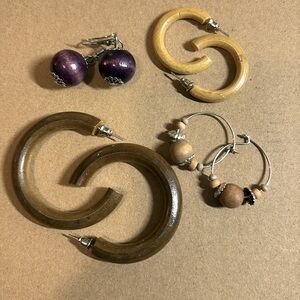 Beautiful vintage wooden earrings!  Set of 4, my fav? PURPLE! They are gorgeous!